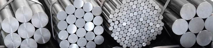 Four bundles of plain round reinforcing steel bars with different diameters