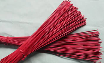 Two bundles of straight cut wire with red PVC coating