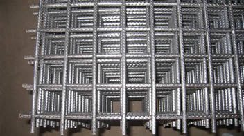 Many square reinforcing meshes piled up with ribbed profile